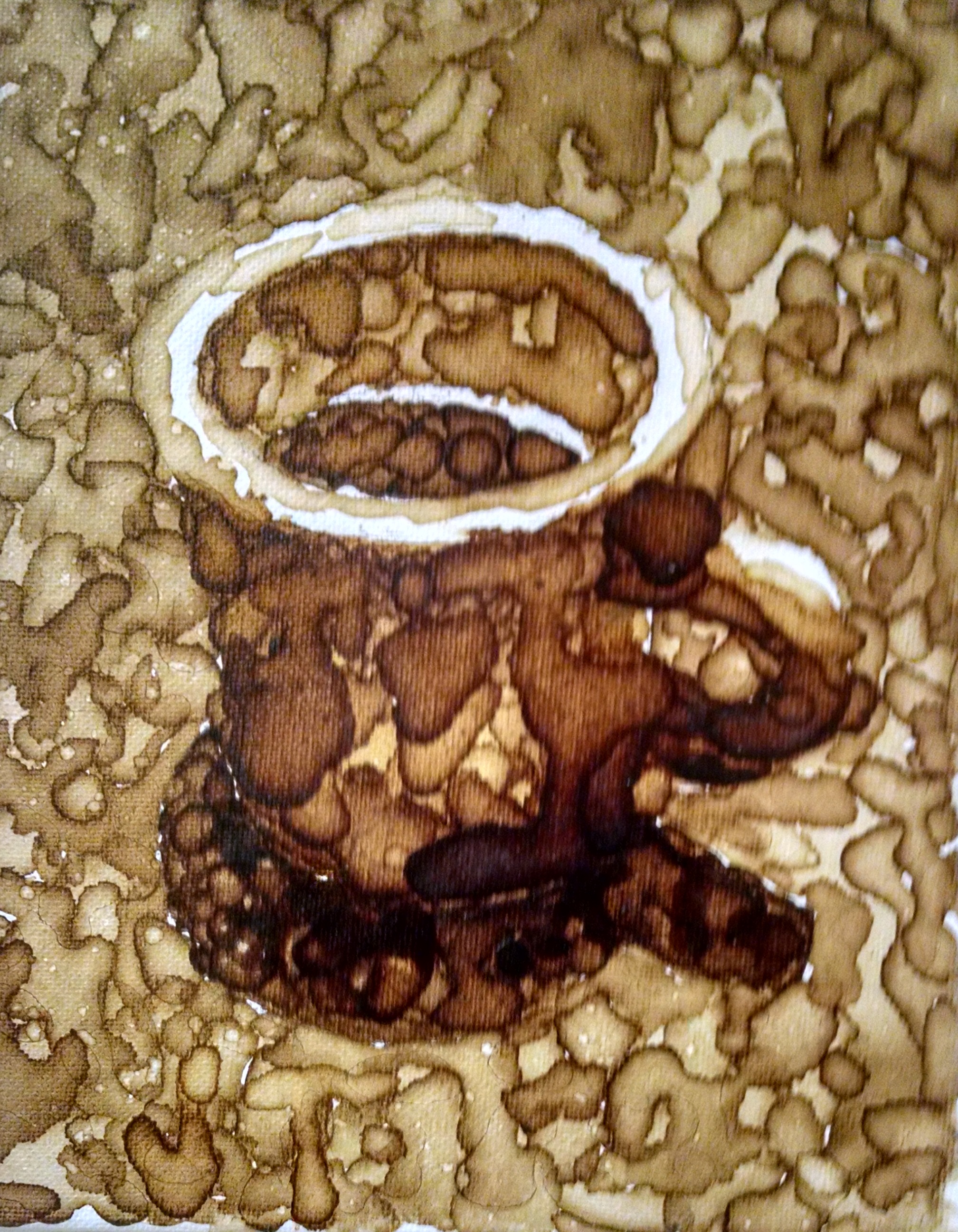 a cup using spilled coffee puddles
